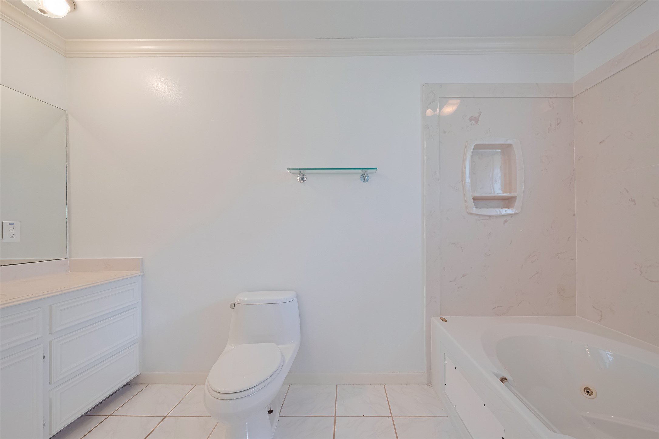 30525 Hegar Road Hockley, TX 77447 - Photo 29 of 49 a bathroom with a granite countertop toilet a sink and bathtub