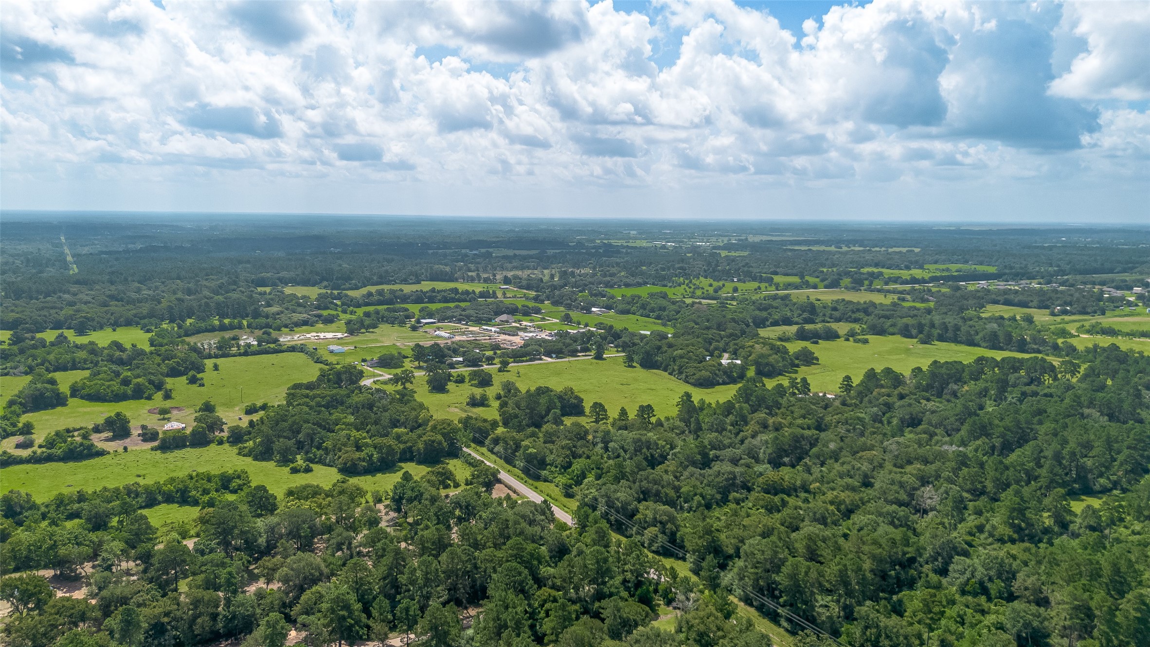 30525 Hegar Road Hockley, TX 77447 - Photo 46 of 49 an aerial view of residential houses with outdoor space and trees