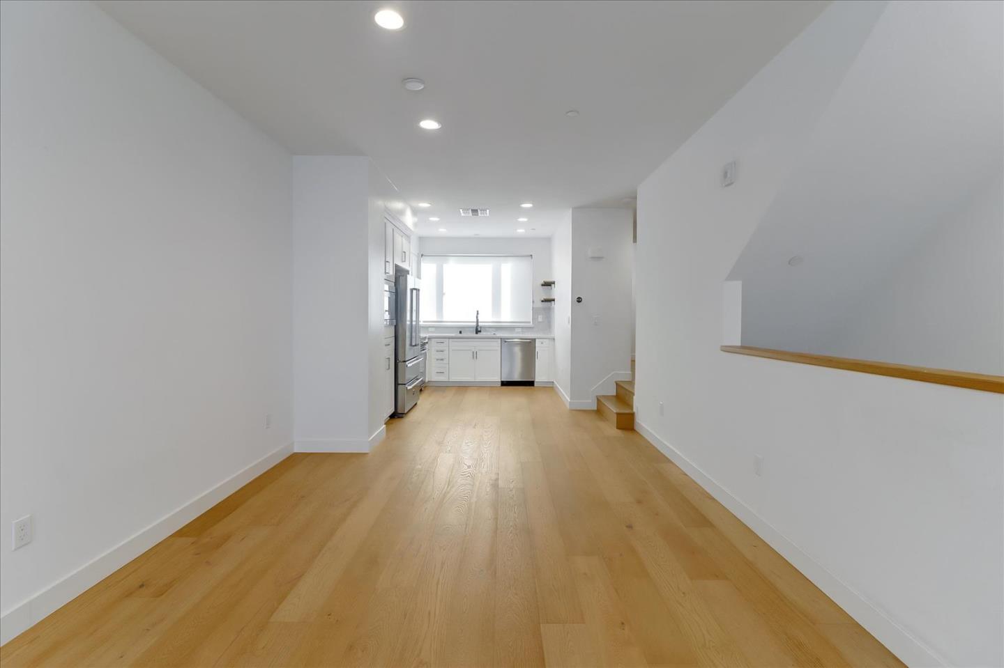 152 Uptown Circle Oakland, CA 94607 - Photo 12 of 33 a view of empty room with wooden floor