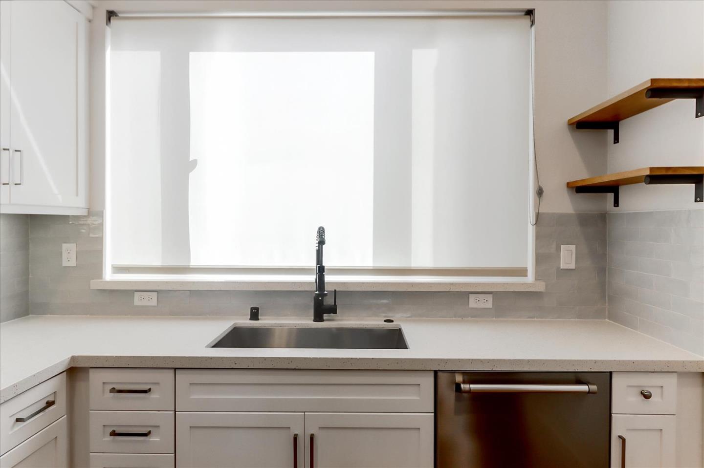 152 Uptown Circle Oakland, CA 94607 - Photo 15 of 33 a kitchen with a sink and cabinets