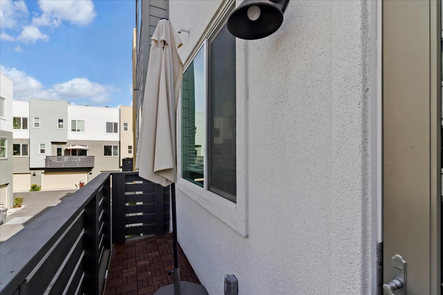 152 Uptown Circle Oakland, CA 94607 - Photo 33 of 33 a kitchen with stainless steel appliances a refrigerator and a stove top oven