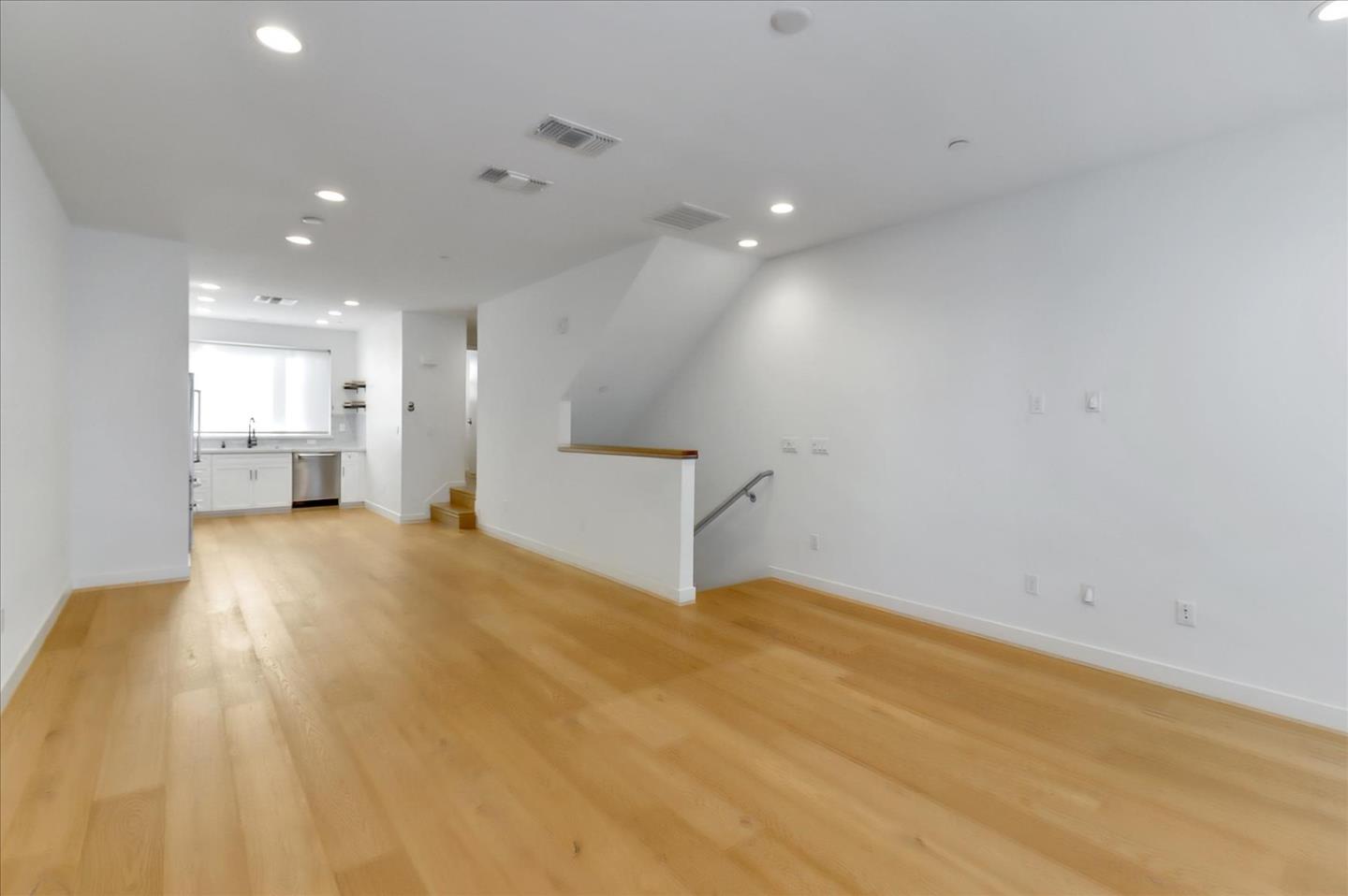 152 Uptown Circle Oakland, CA 94607 - Photo 10 of 33 a view of empty room with wooden floor