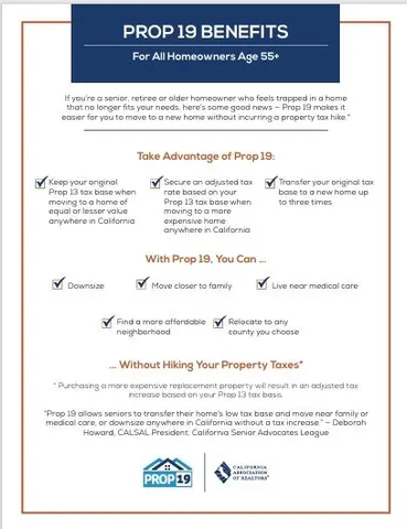 a view of an empty room with a ceiling fan