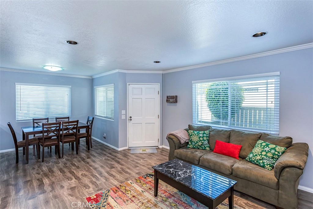 7065 9th Street, Unit 1 Buena Park, CA 90621 - Photo 1 of 36 a living room with furniture and wooden floor