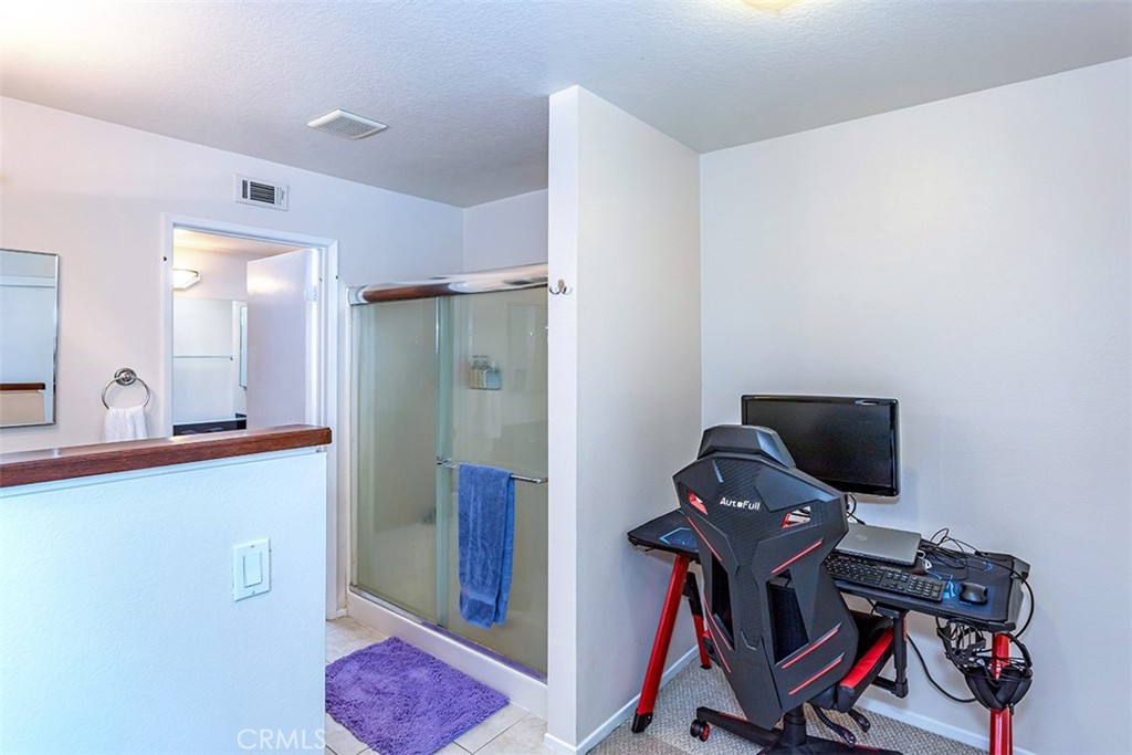 7065 9th Street, Unit 1 Buena Park, CA 90621 - Photo 18 of 36 a view of a room with gym equipment