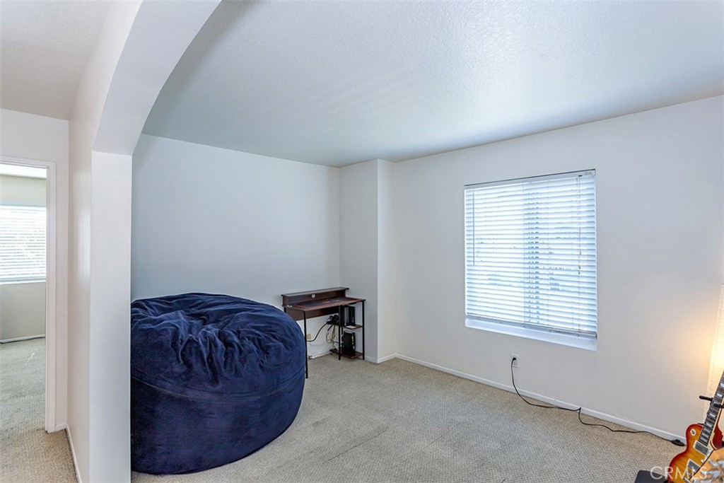 7065 9th Street, Unit 1 Buena Park, CA 90621 - Photo 24 of 36 a view of livingroom with furniture and window