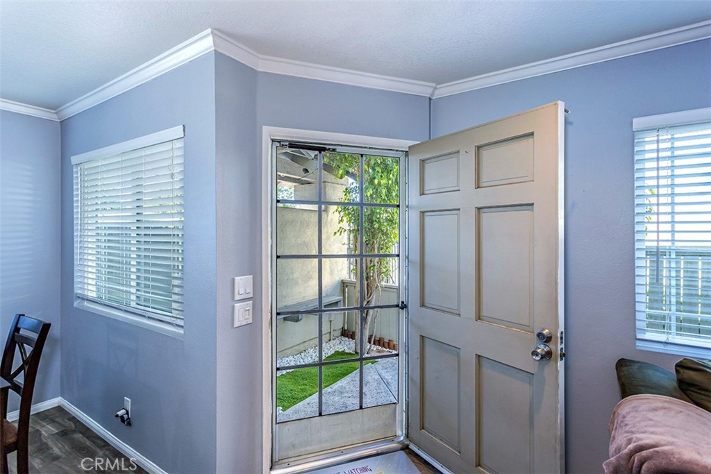 7065 9th Street, Unit 1 Buena Park, CA 90621 - Photo 3 of 36 a living room with furniture and a window