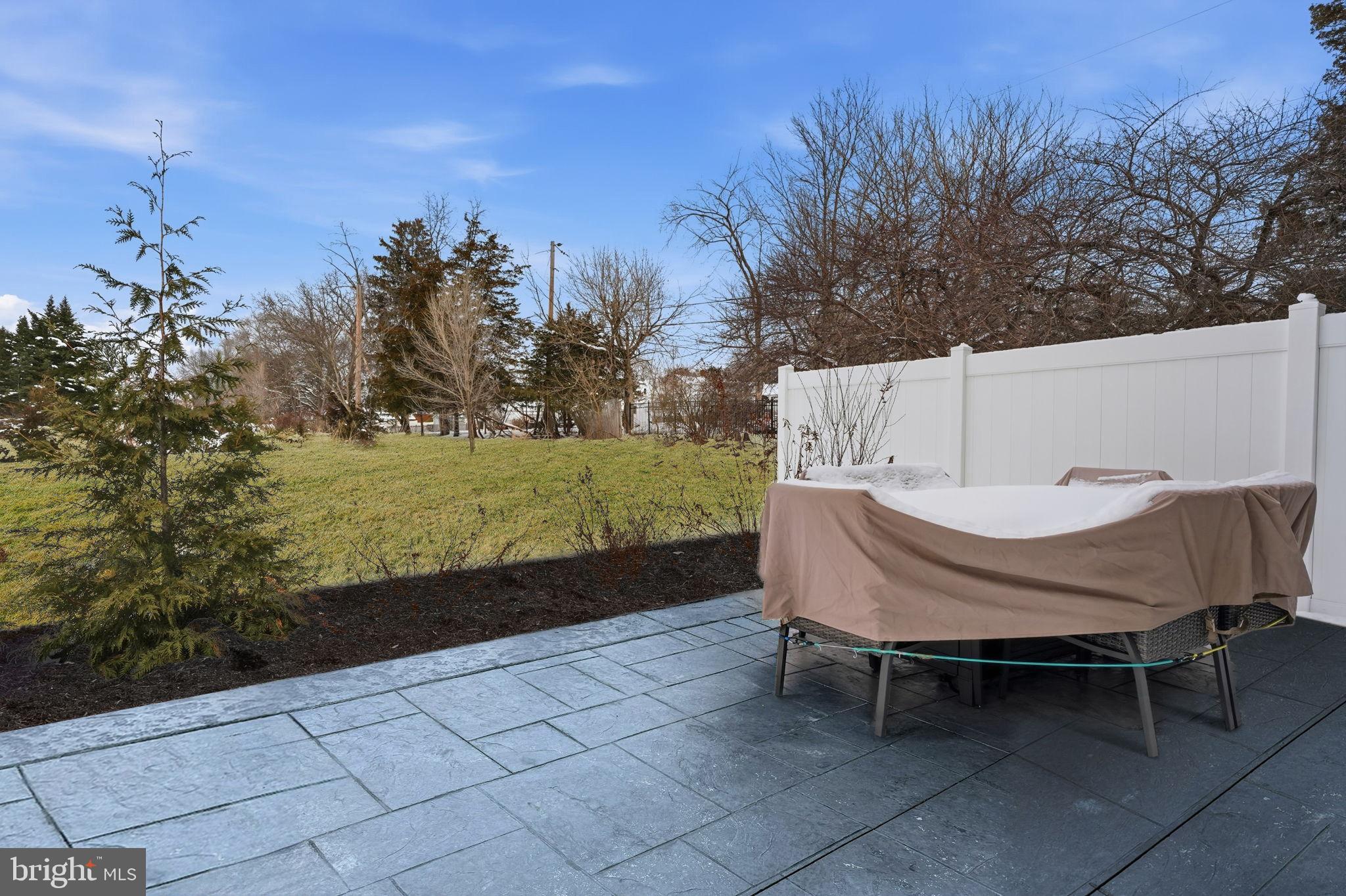 975 Still Waters Pennsburg, PA 18073 - Photo 19 of 20 Serene outdoor space with lush greenery.