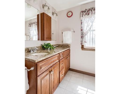246 Pleasantdale Road Rutland, MA 01543 - Photo 16 of 29 a bathroom with a granite countertop sink and a mirror