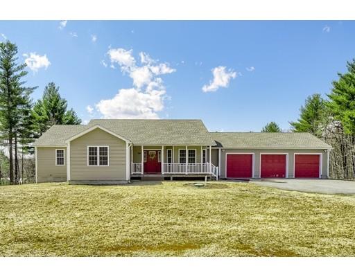 246 Pleasantdale Road Rutland, MA 01543 - Photo 2 of 29 a view of a house with a big yard and large trees