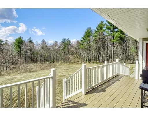 246 Pleasantdale Road Rutland, MA 01543 - Photo 23 of 29 a view of balcony with wooden floor and fence