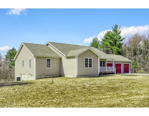 246 Pleasantdale Road Rutland, MA 01543 - Photo 3 of 29 a house view with a garden space