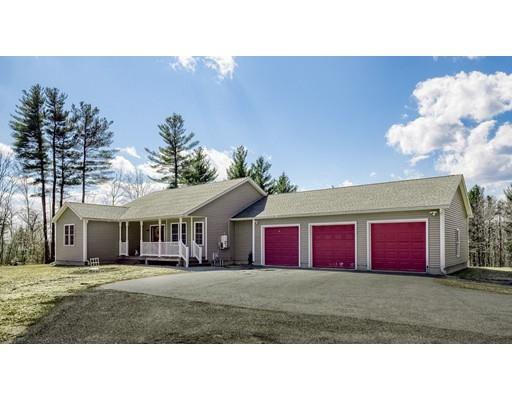 246 Pleasantdale Road Rutland, MA 01543 - Photo 4 of 29 a front view of a house with a yard