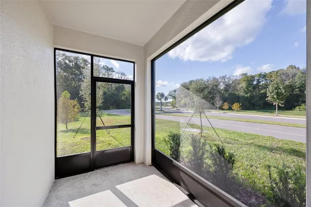 a view of a large window with an outdoor space