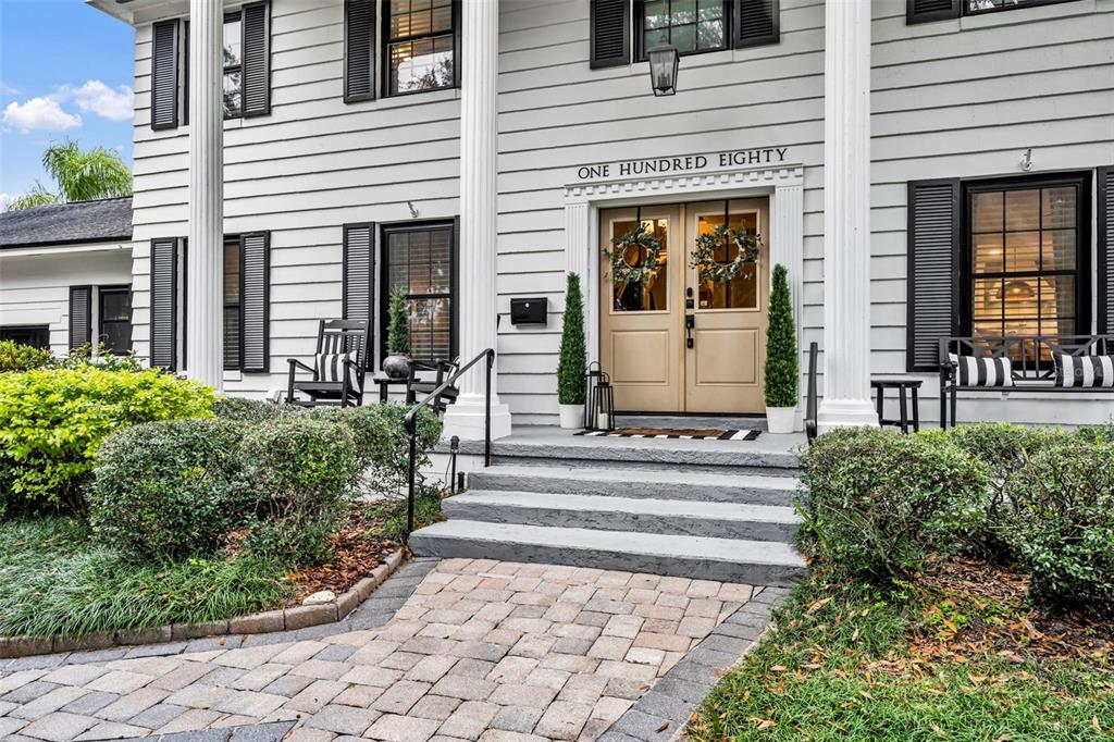 180 Spring Lake Hills Drive Altamonte Springs, FL 32714 - Photo 3 of 67 a front view of a house with a garden