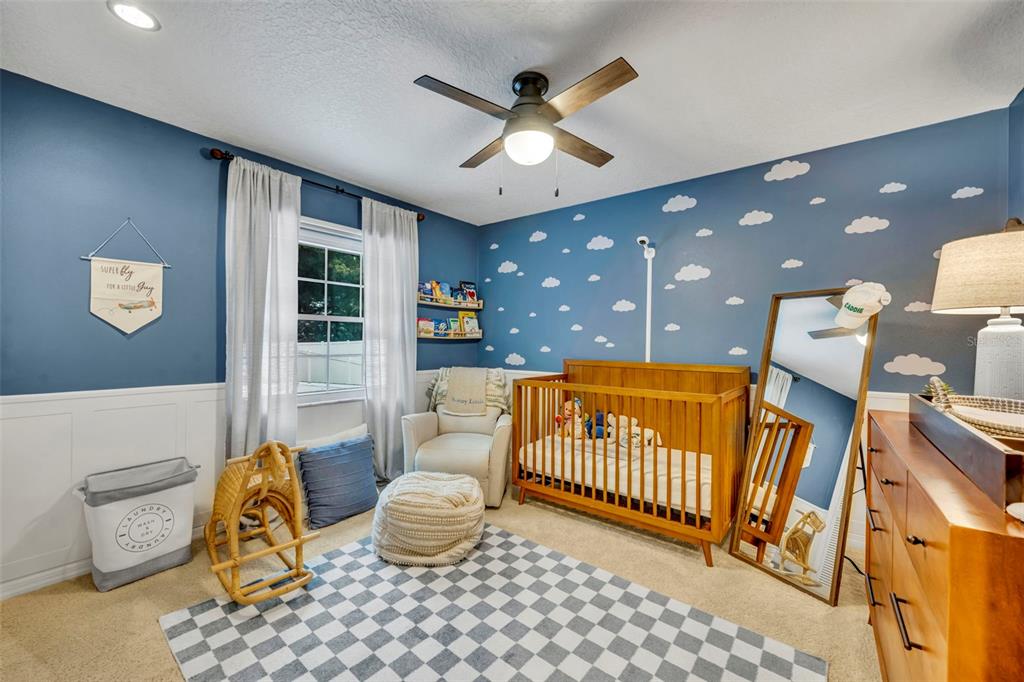 180 Spring Lake Hills Drive Altamonte Springs, FL 32714 - Photo 31 of 67 a bedroom with furniture and a window