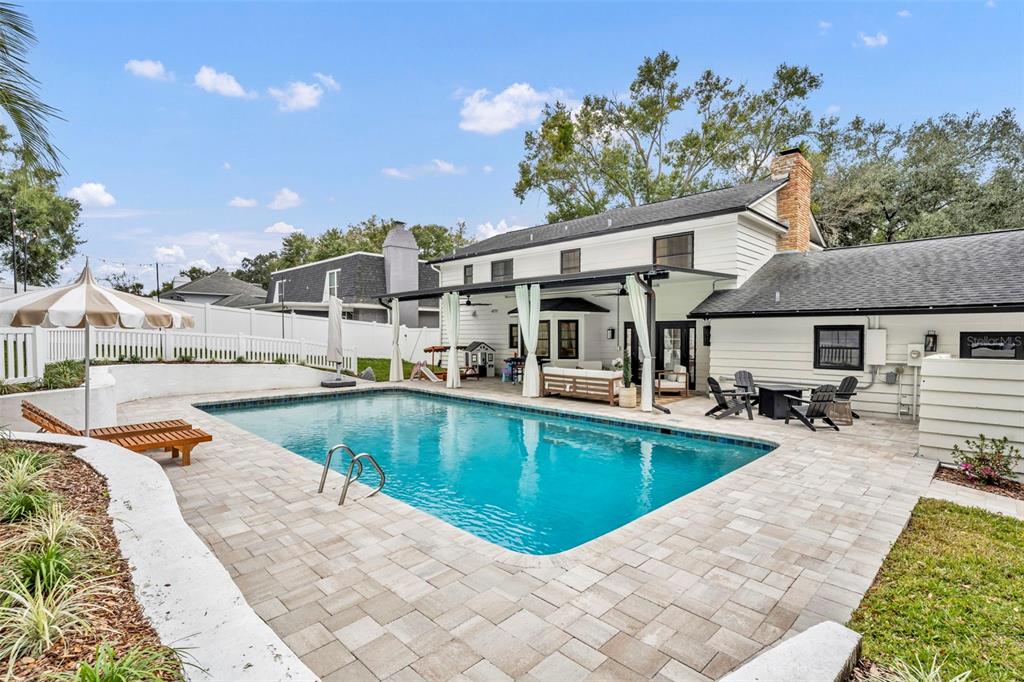 180 Spring Lake Hills Drive Altamonte Springs, FL 32714 - Photo 54 of 67 a view of a house with swimming pool and sitting area