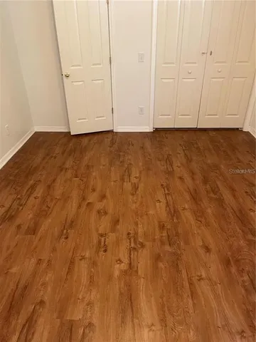 a view of a pathway with a yard