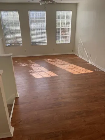 an empty room with windows