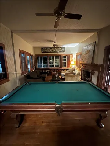 a room with green walls and a window