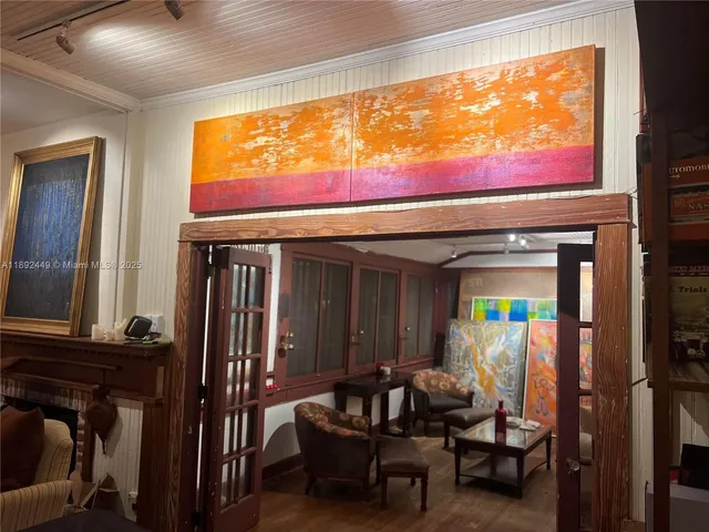 a view of a livingroom with furniture