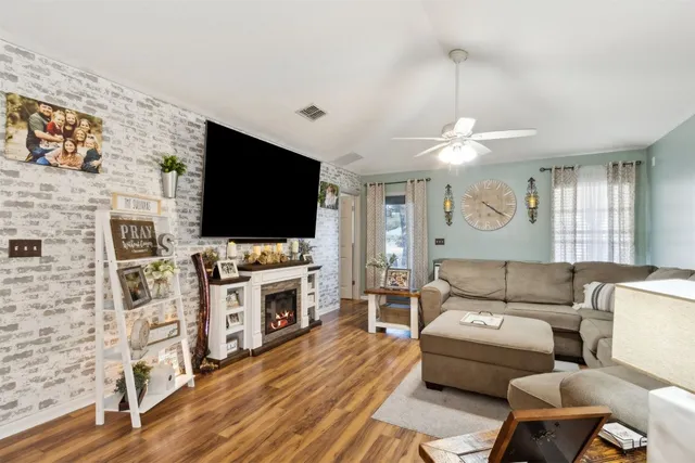 a kitchen with stainless steel appliances granite countertop a sink and cabinets