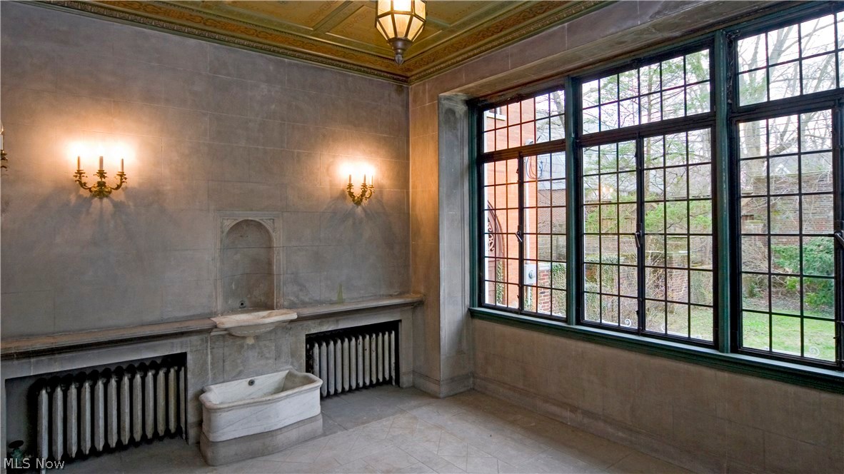 2636 East Overlook Road Cleveland, OH 44106 - Photo 9 of 24 The Conservatory is just off the Library. Its features include a fountain (for which plumbing is not currently linked), leaded windows and a coffered ceiling with unique, beaux arts panels