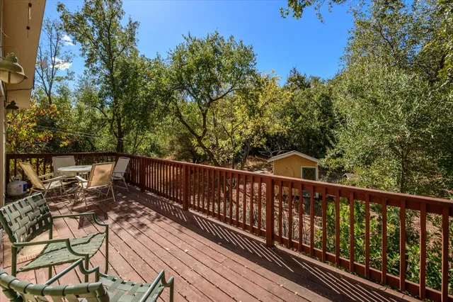 a view of balcony with furniture