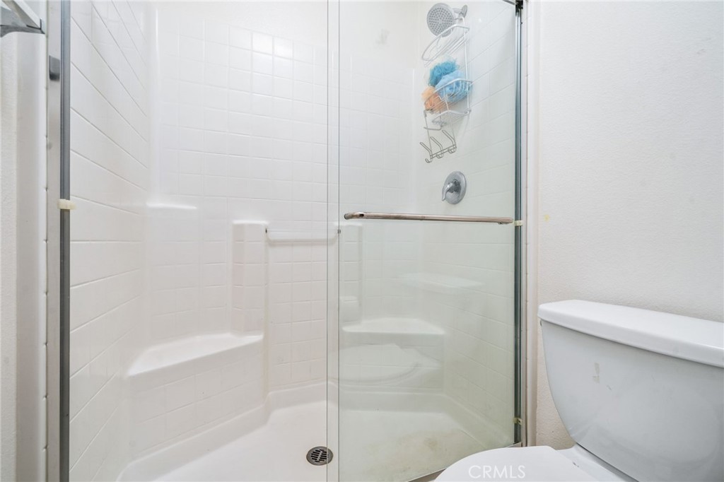 8836 Jacaranda Avenue, Unit D Montclair, CA 91763 - Photo 17 of 26 a bathroom with a shower