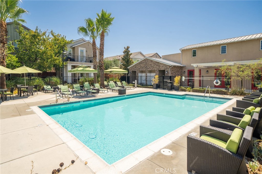 8836 Jacaranda Avenue, Unit D Montclair, CA 91763 - Photo 23 of 26 a view of a house with a swimming pool