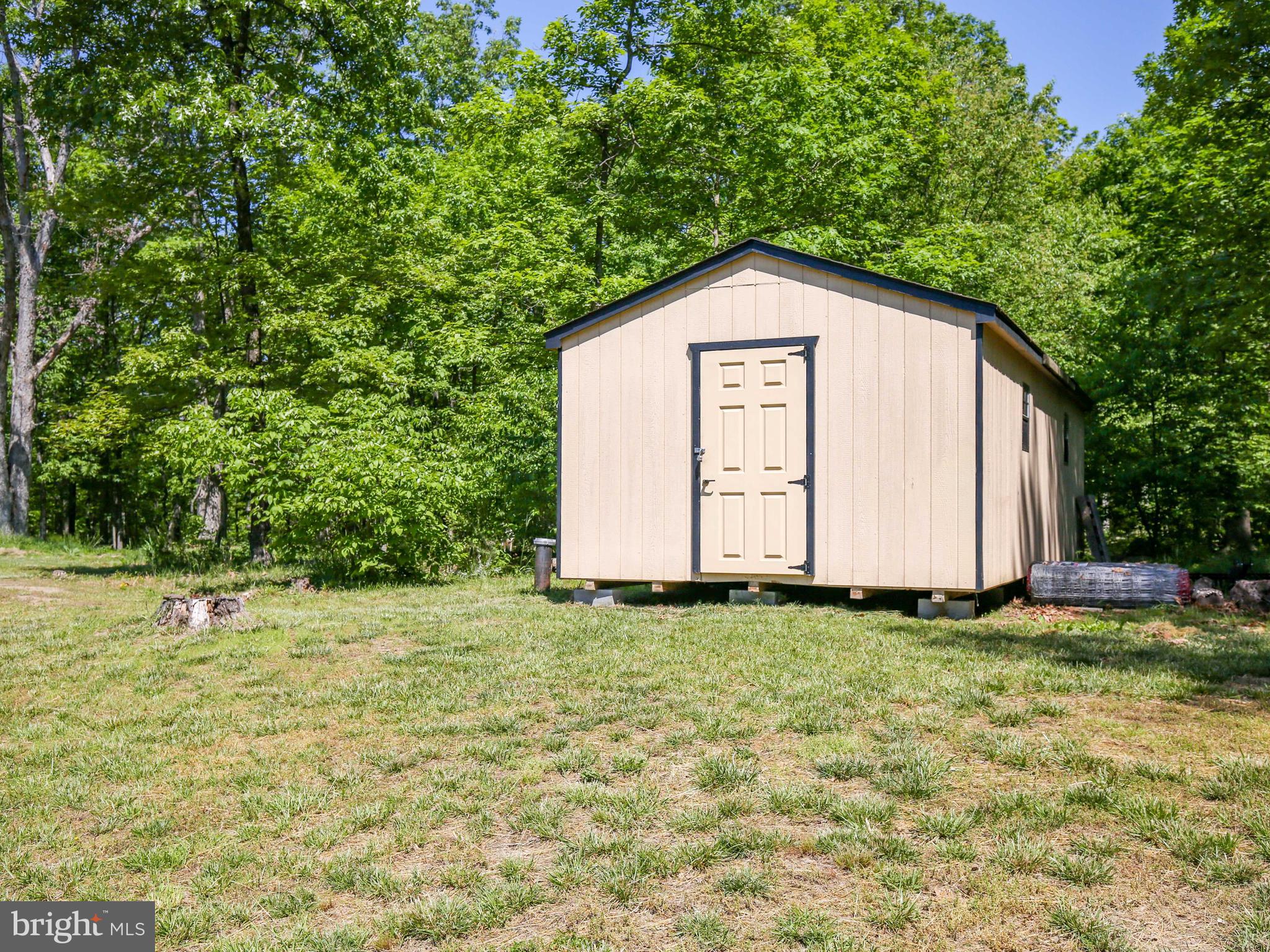 959 Adams Road Winchester, VA 22603 - Photo 39 of 42 Storage shed conveys