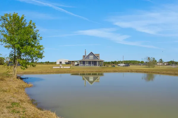 a view of a lake with a city view