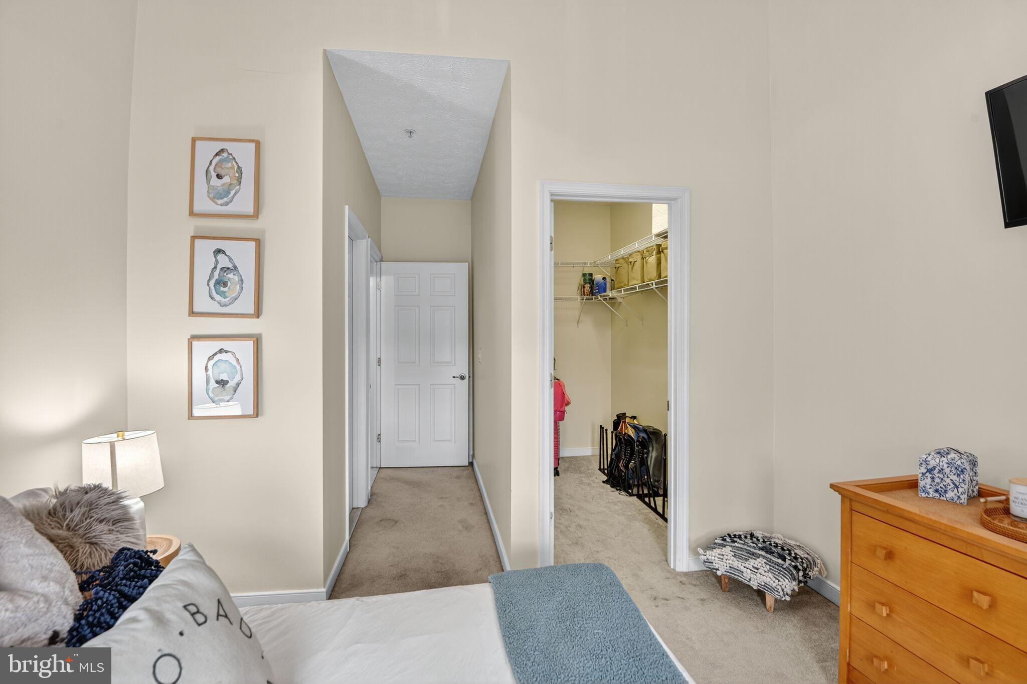 2013 Warners Terrace South, Unit 348 Annapolis, MD 21401 - Photo 18 of 23 a bedroom with a bed and a couch