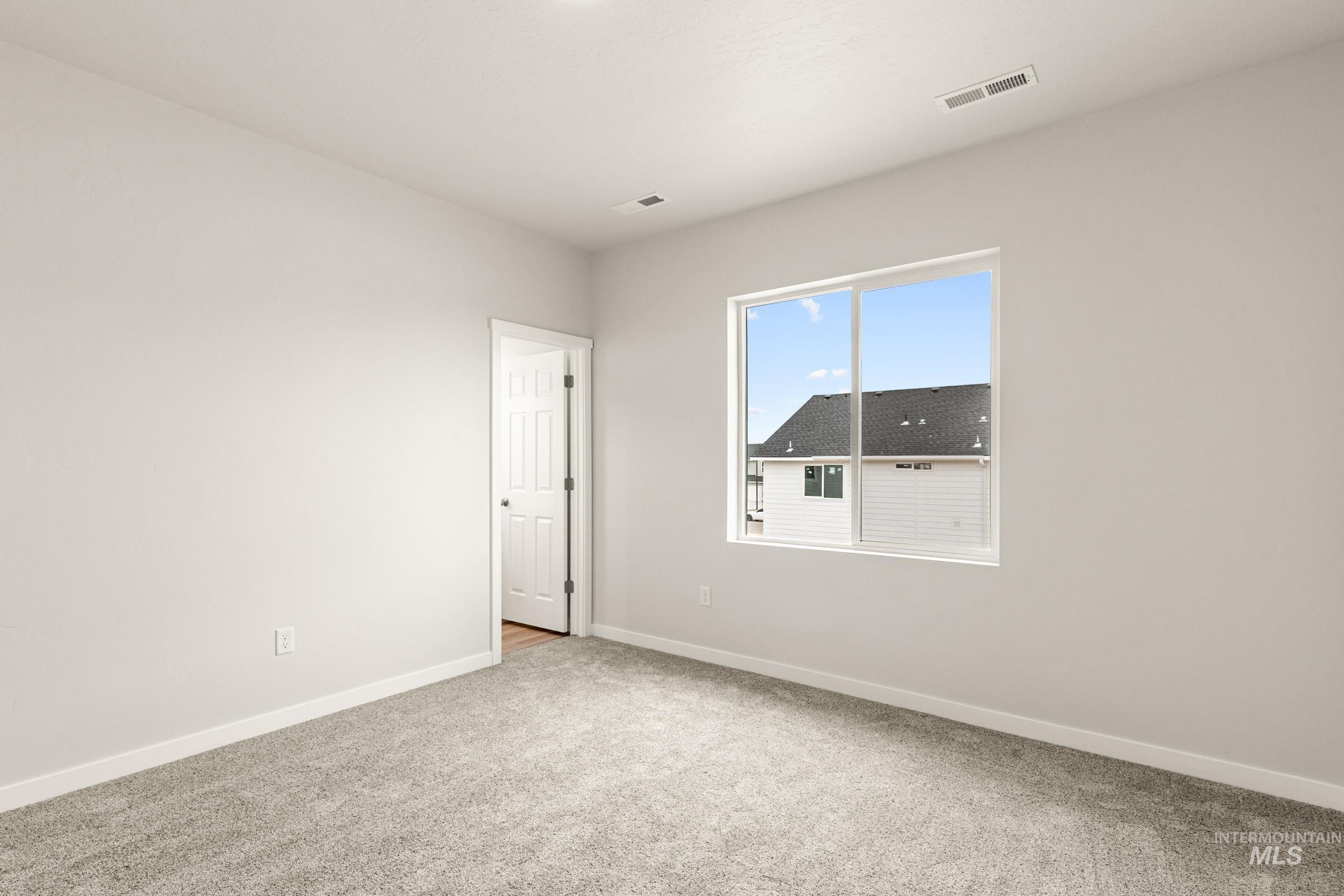 13688 Redway Court Caldwell, ID 83607 - Photo 19 of 26 Unfurnished room featuring baseboards and light colored carpet