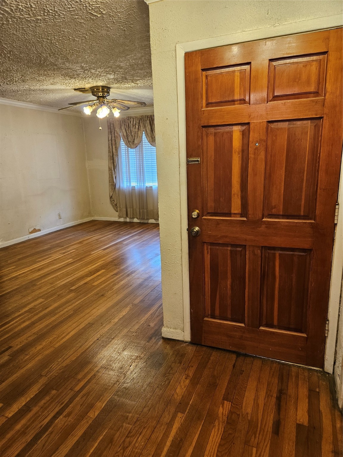 5218 Cortelyou Lane Houston, TX 77021 - Photo 33 of 45 a view of entryway with wooden floor