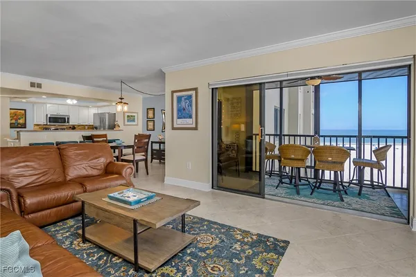 a living room with furniture and a table