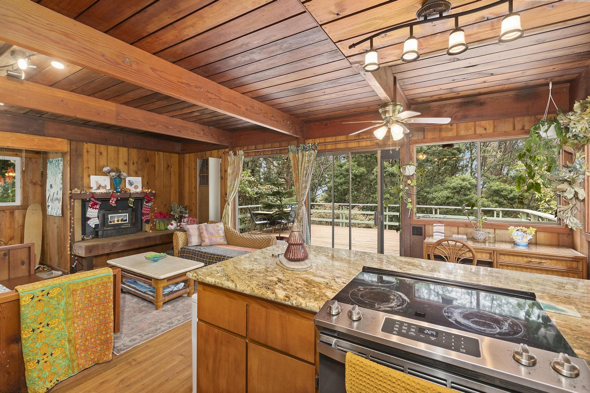 2450 Piiholo Road Makawao, HI 96768 - Photo 32 of 39 a outdoor space with the couches and dining table with the garden view