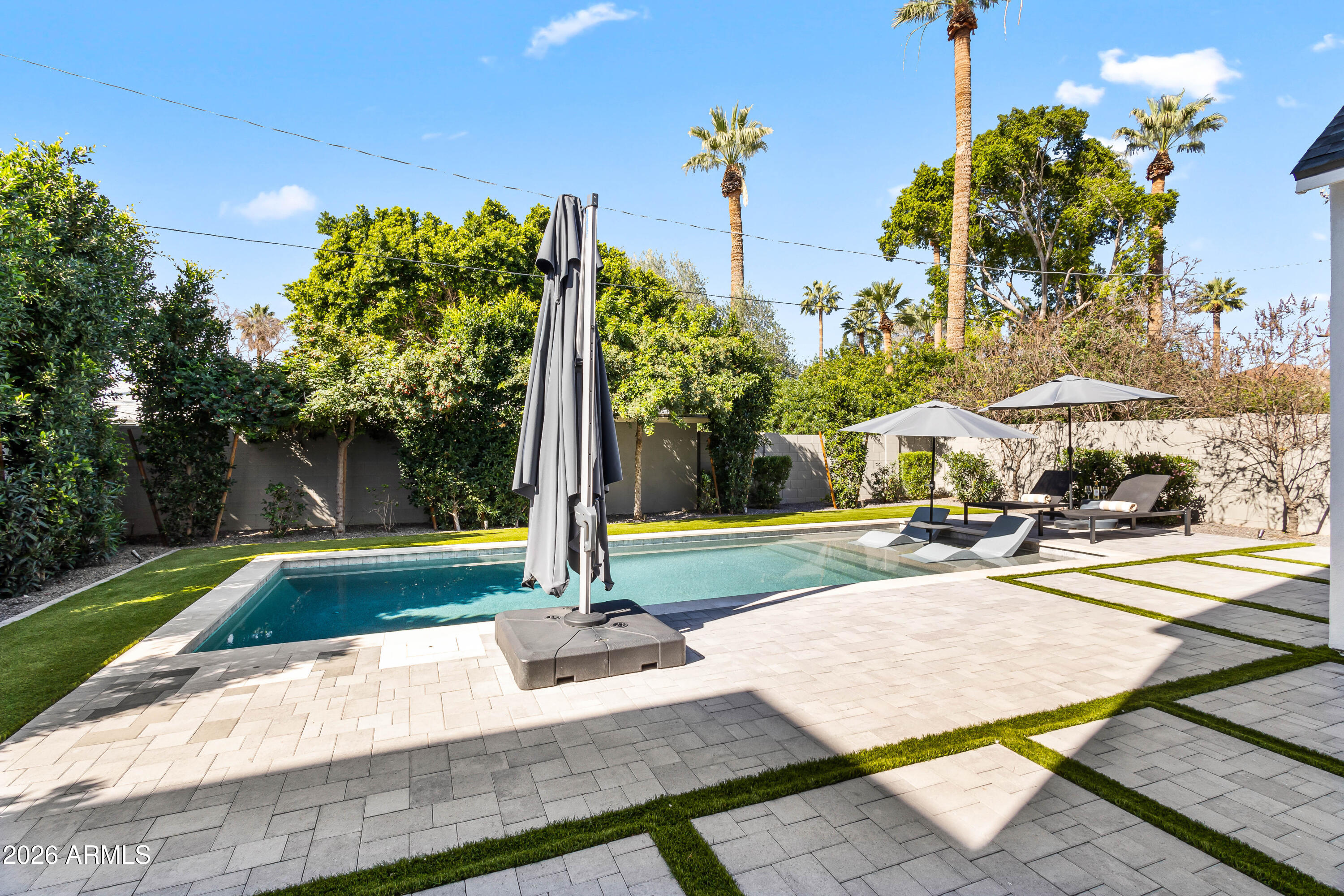 5136 North 10th Way Phoenix, AZ 85014 - Photo 39 of 42 Custom pavers and turf
