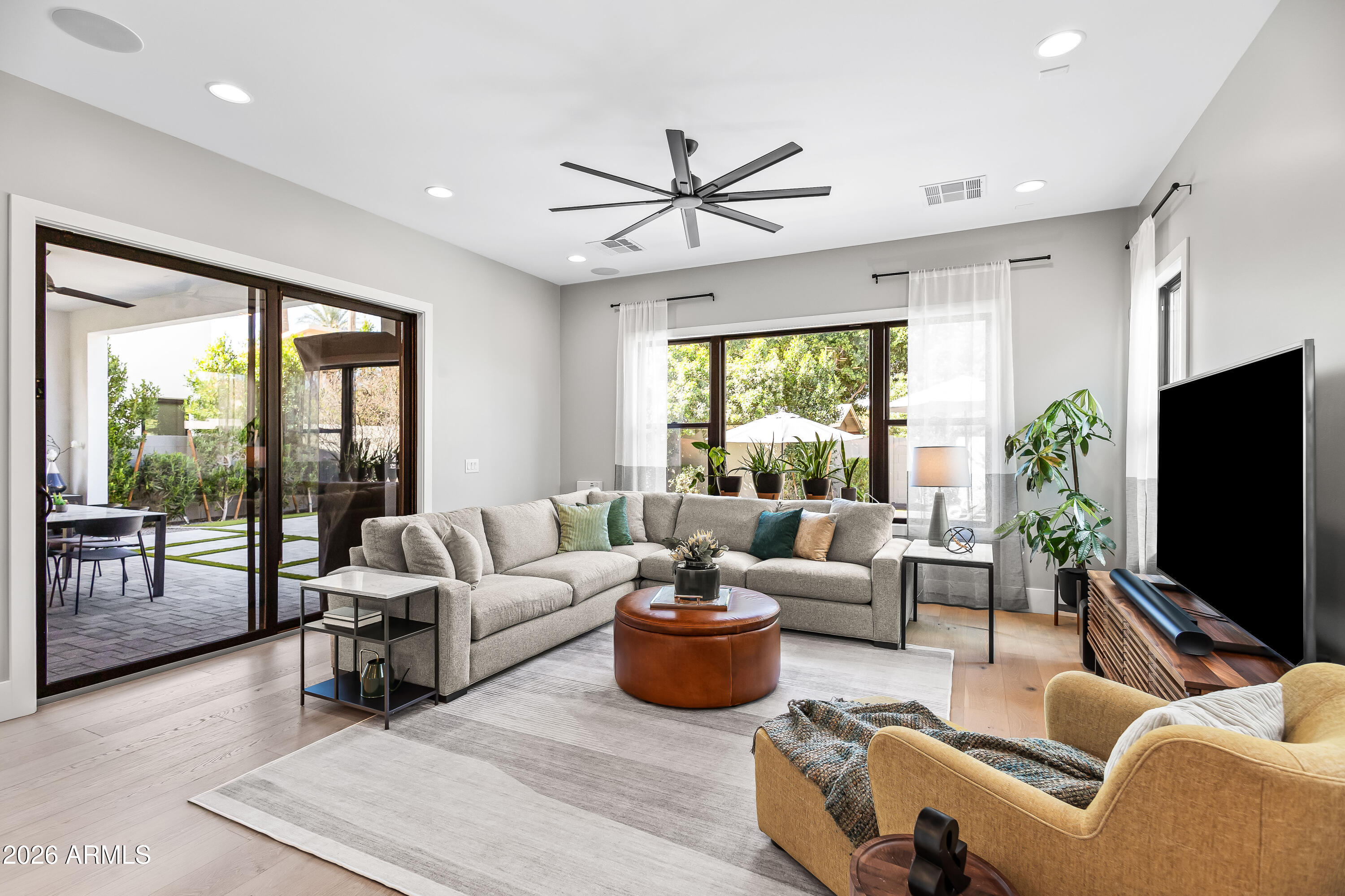 5136 North 10th Way Phoenix, AZ 85014 - Photo 6 of 42 Family Room opens to covered patio