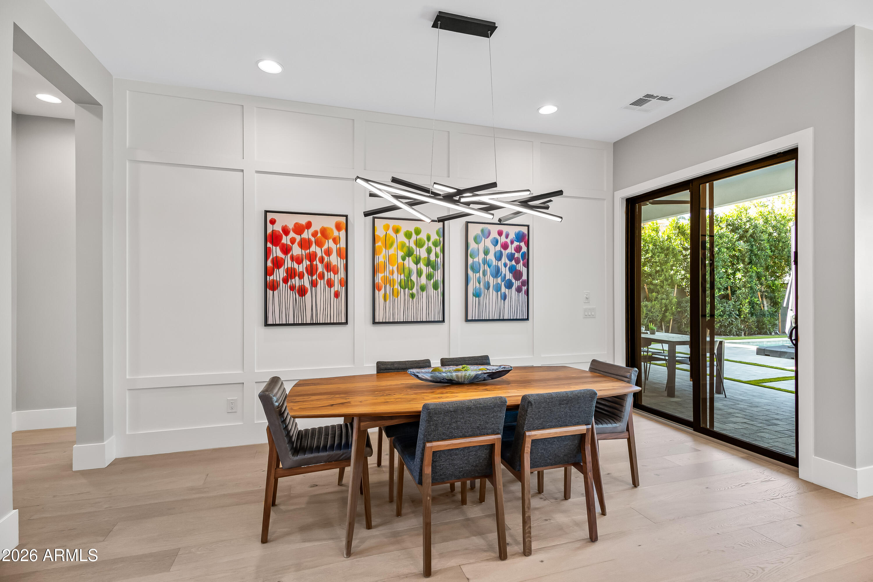 5136 North 10th Way Phoenix, AZ 85014 - Photo 8 of 42 Dining Room boasts designer chandelier