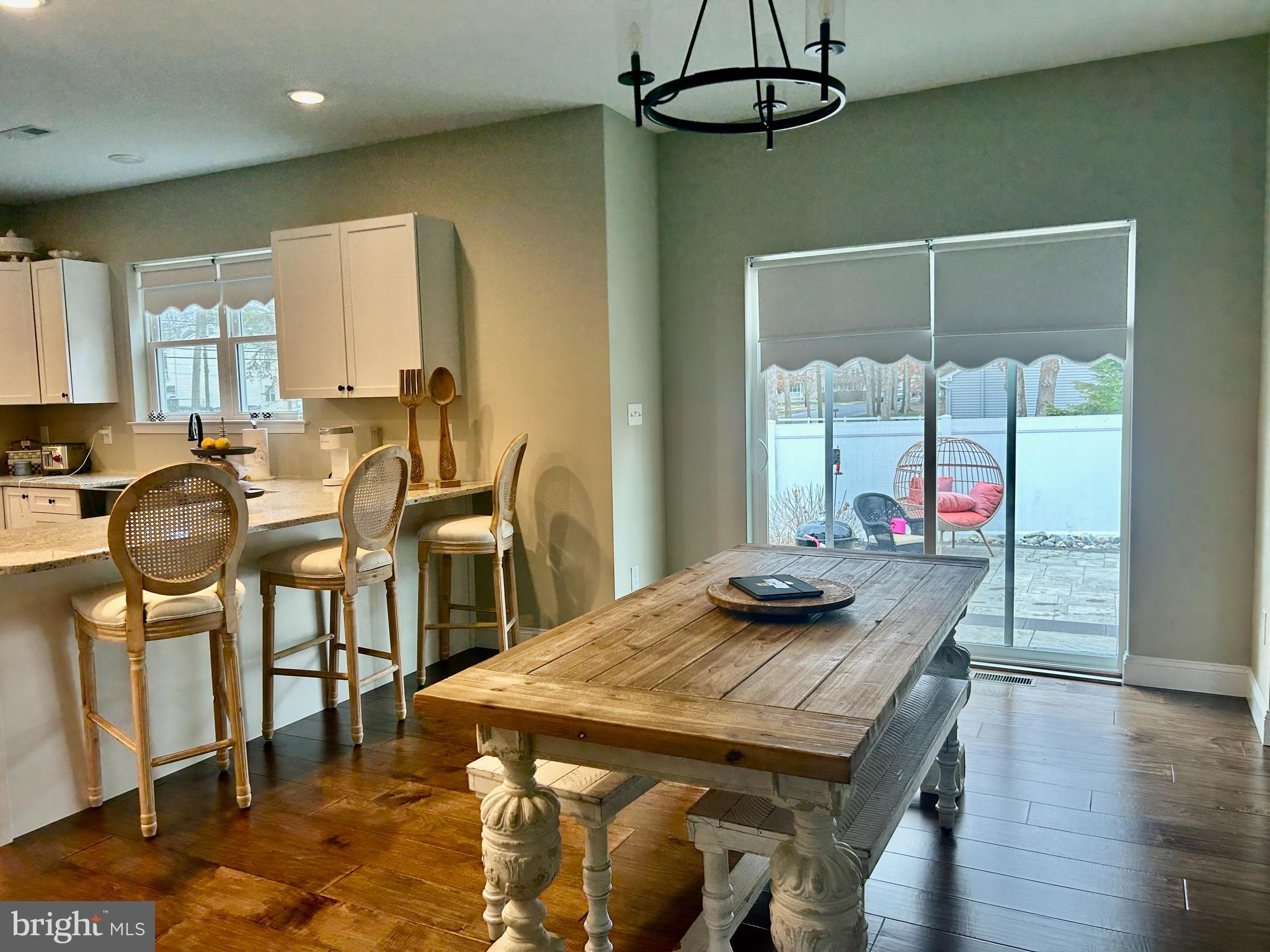 442 Waterfords Edge Court Atco, NJ 08004 - Photo 12 of 37 a view of a dining room with furniture and wooden floor