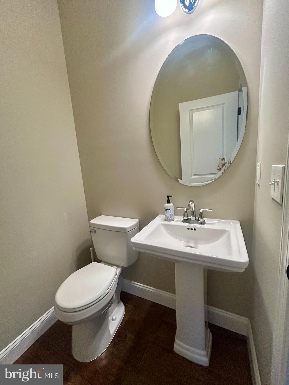 442 Waterfords Edge Court Atco, NJ 08004 - Photo 16 of 37 a white toilet sitting next to a bathroom sink
