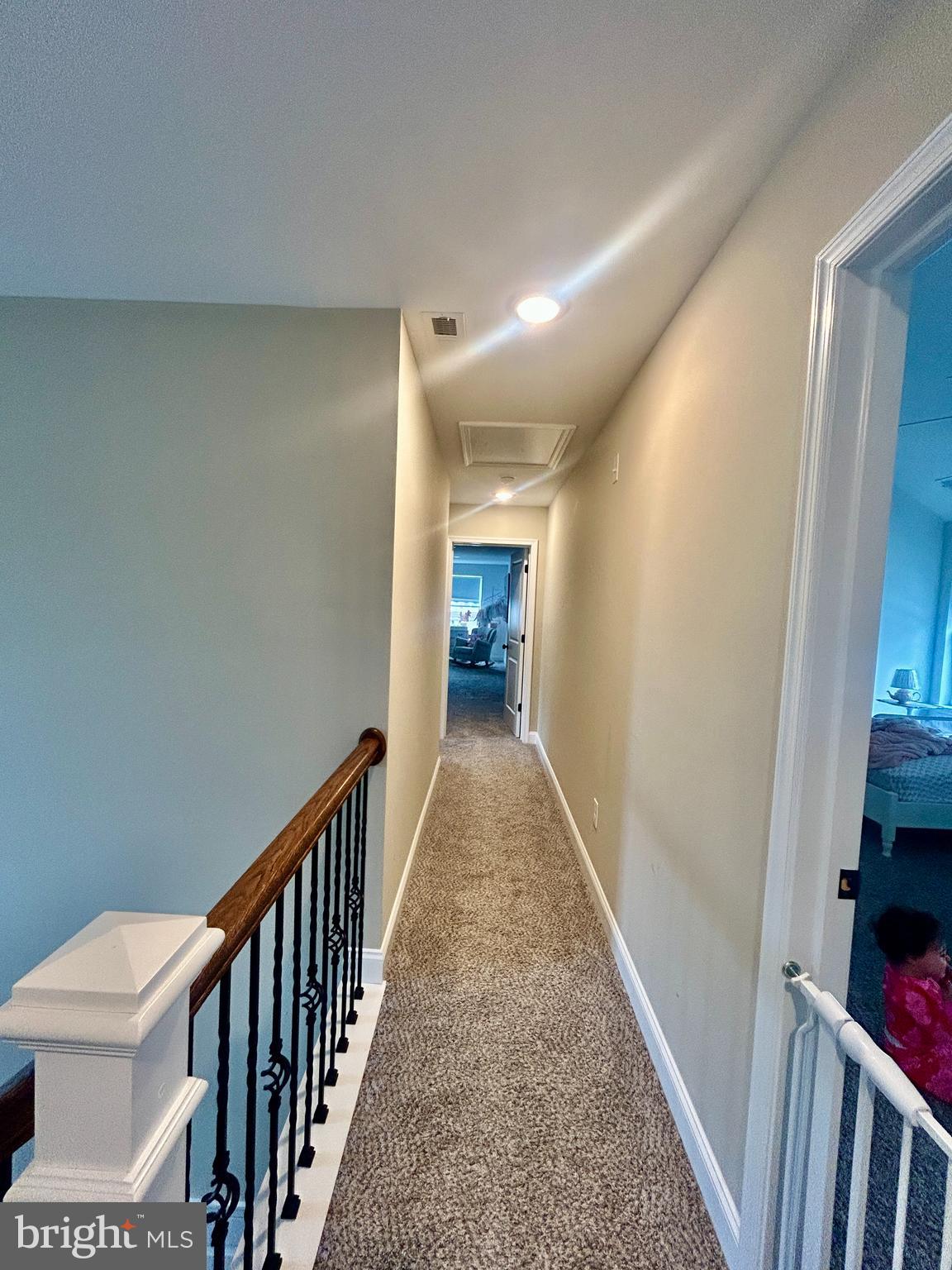 442 Waterfords Edge Court Atco, NJ 08004 - Photo 19 of 37 a view of a hallway with wooden floor and a bathroom