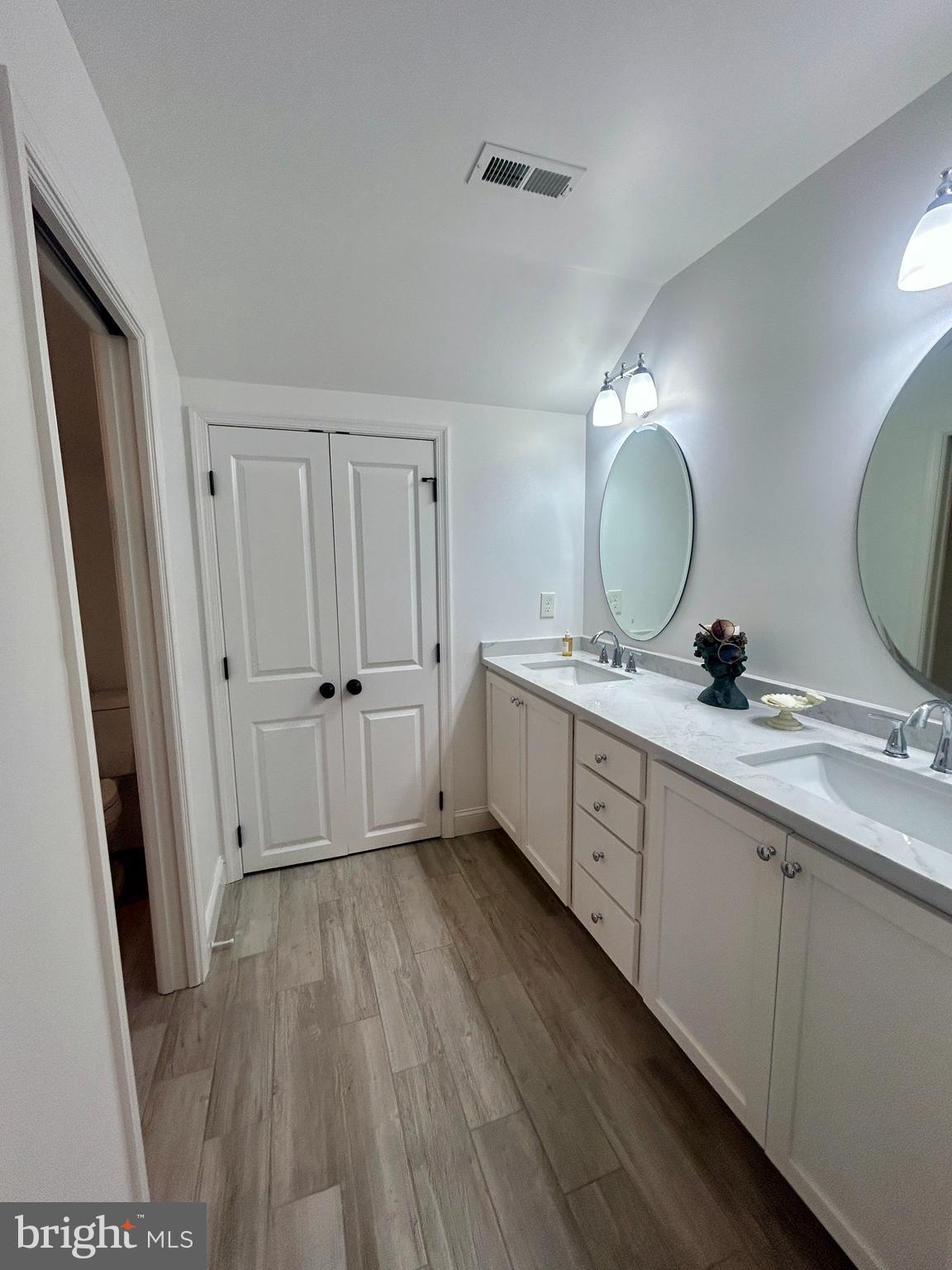 442 Waterfords Edge Court Atco, NJ 08004 - Photo 22 of 37 a spacious bathroom with a double vanity sink and a mirror
