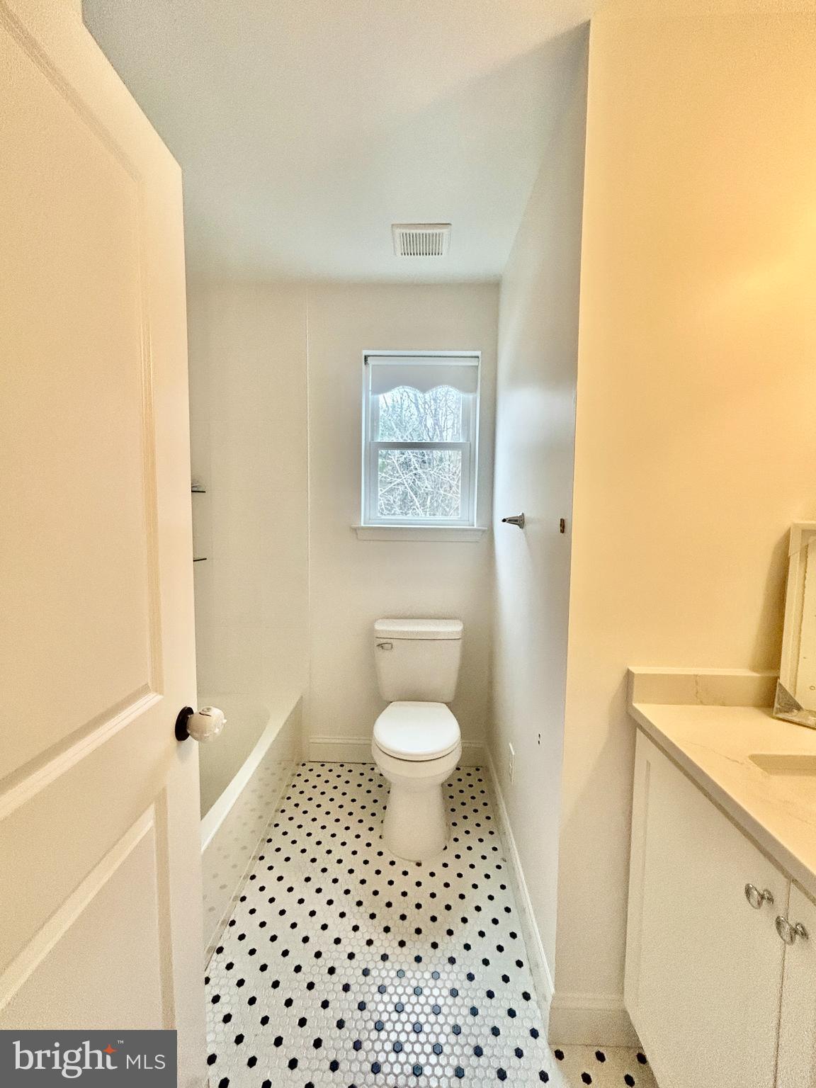 442 Waterfords Edge Court Atco, NJ 08004 - Photo 28 of 37 a bathroom with a granite countertop toilet a sink a shower