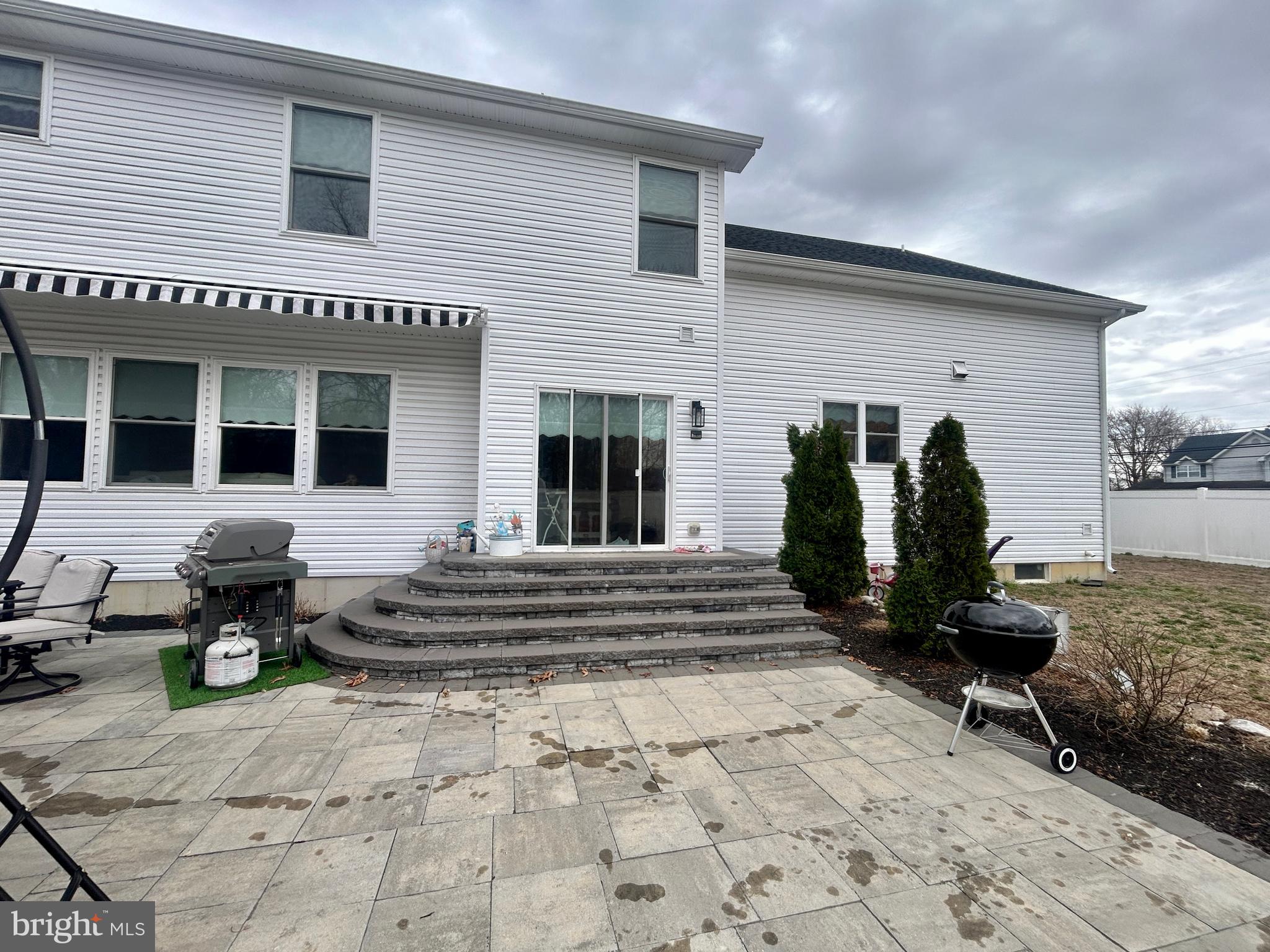 442 Waterfords Edge Court Atco, NJ 08004 - Photo 37 of 37 a view of a patio with two chairs and a potted plant