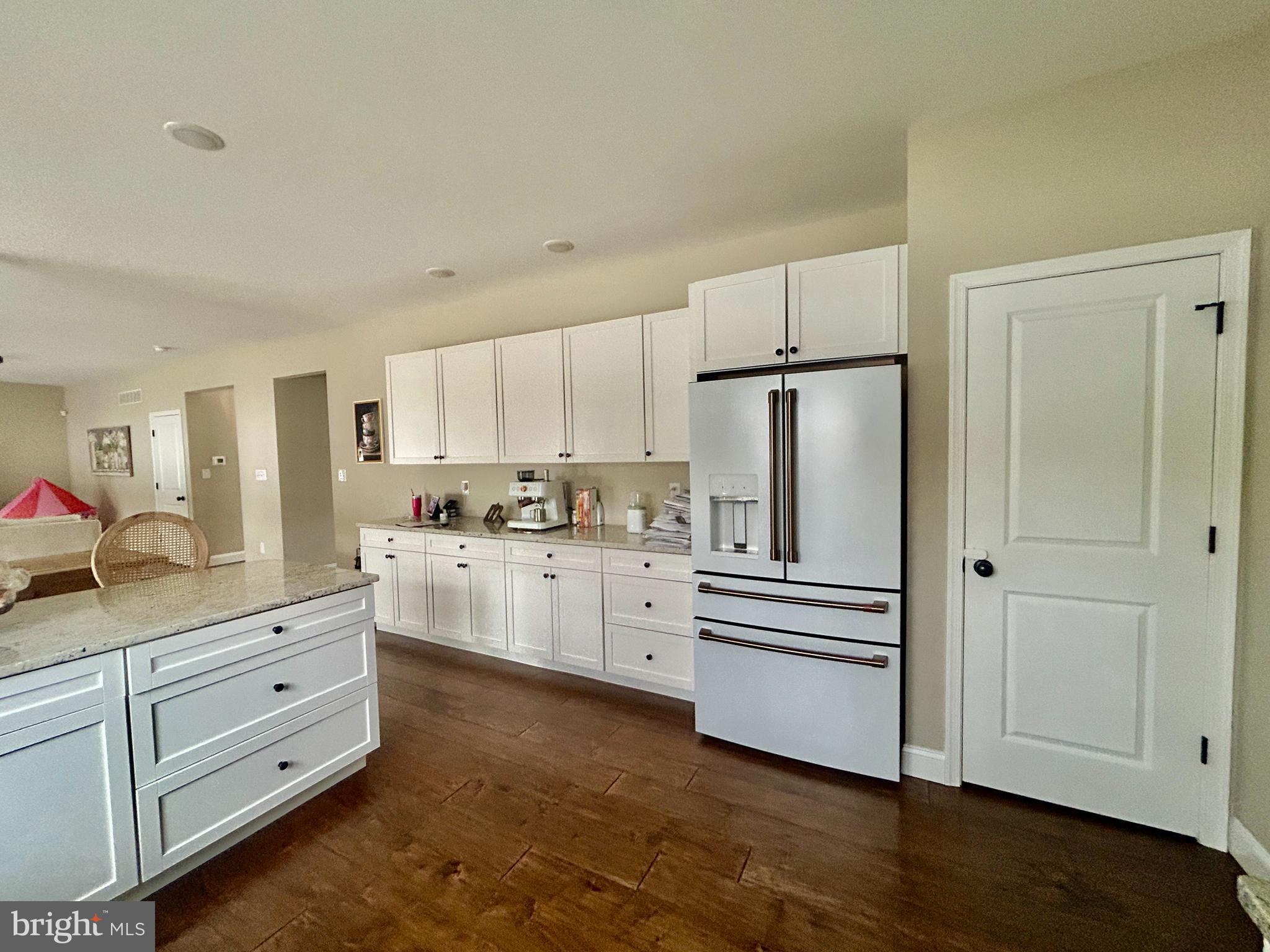 442 Waterfords Edge Court Atco, NJ 08004 - Photo 7 of 37 a kitchen with white cabinets and white appliances