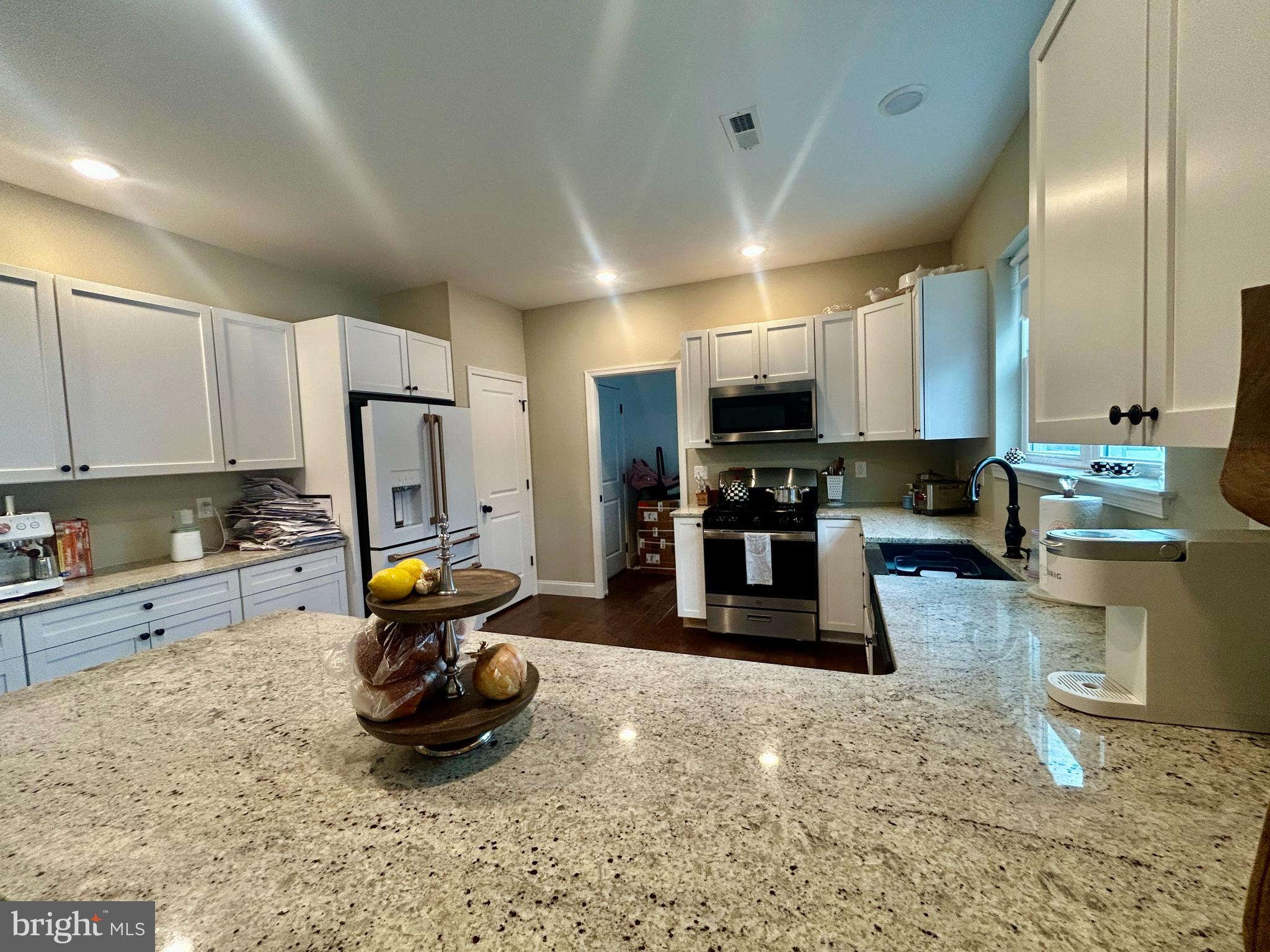 442 Waterfords Edge Court Atco, NJ 08004 - Photo 8 of 37 a kitchen with sink refrigerator and cabinets