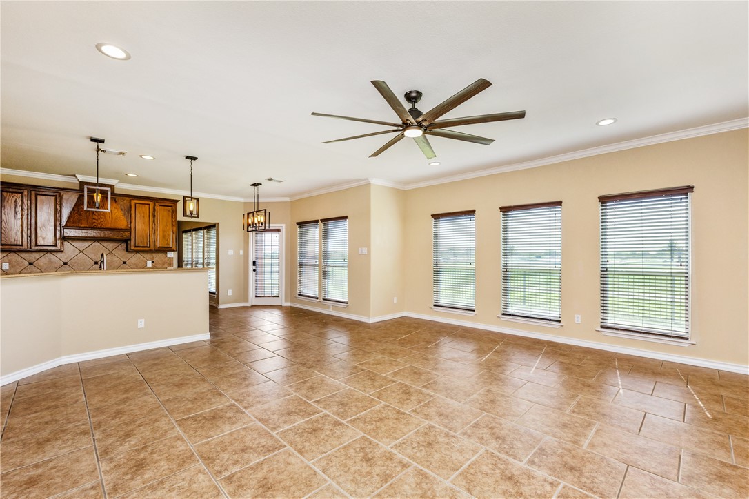 307 Heathercrest Portland, TX 78374 - Photo 13 of 40 a view of an empty room with kitchen and window