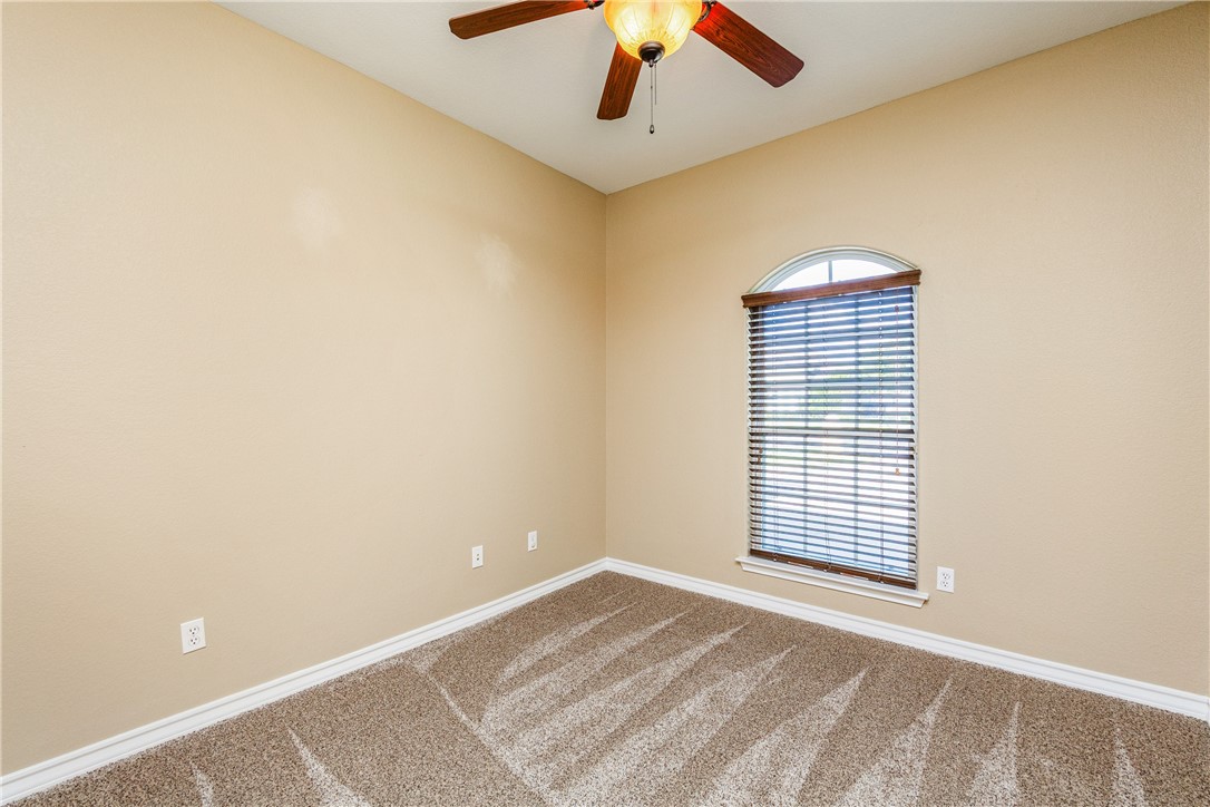 307 Heathercrest Portland, TX 78374 - Photo 23 of 40 a view of an empty room with a window